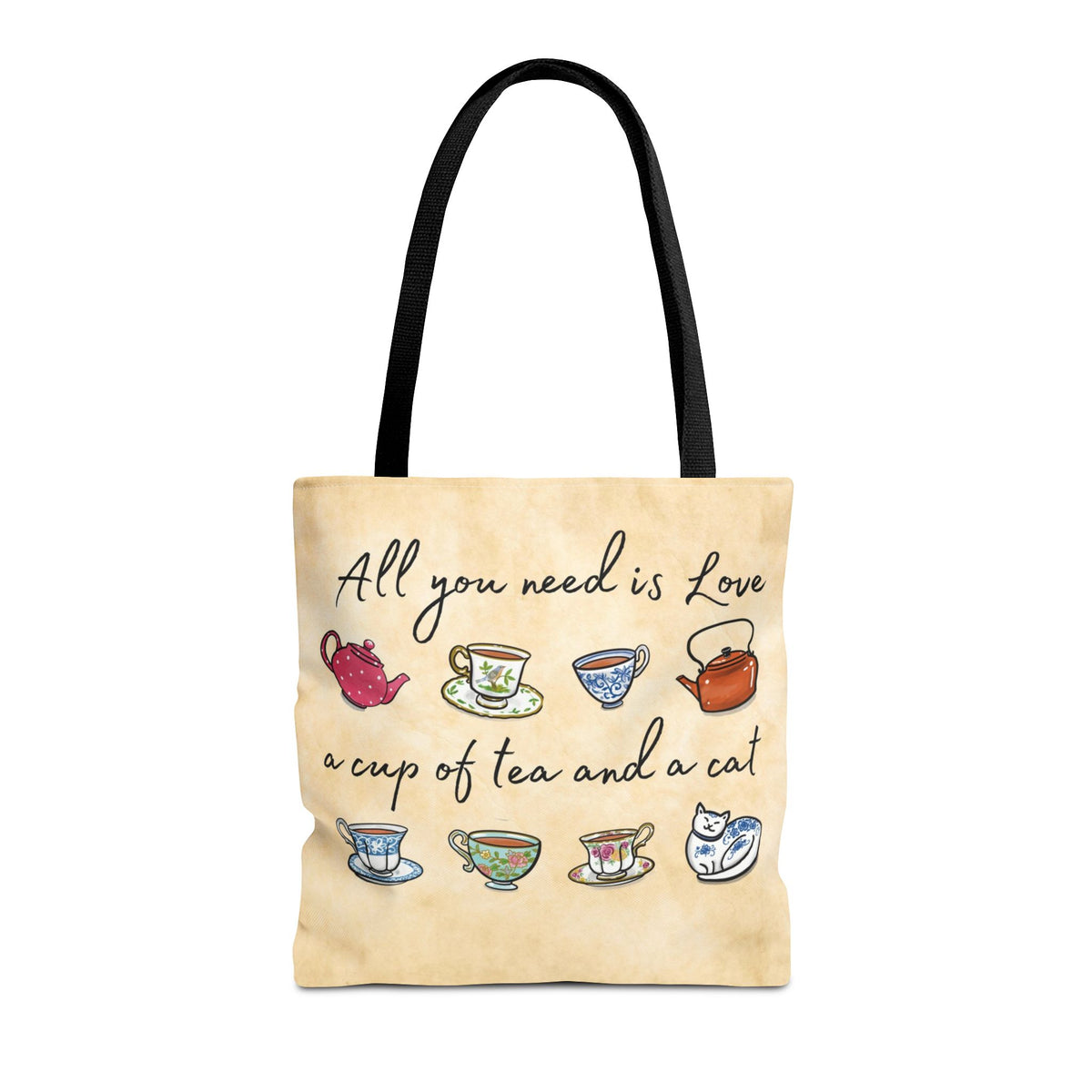 Tote bag features hand drawn teacups and cat with lettering that reads "All you need is love, a cup of tea and a cat. Ideal for Cat Mom.