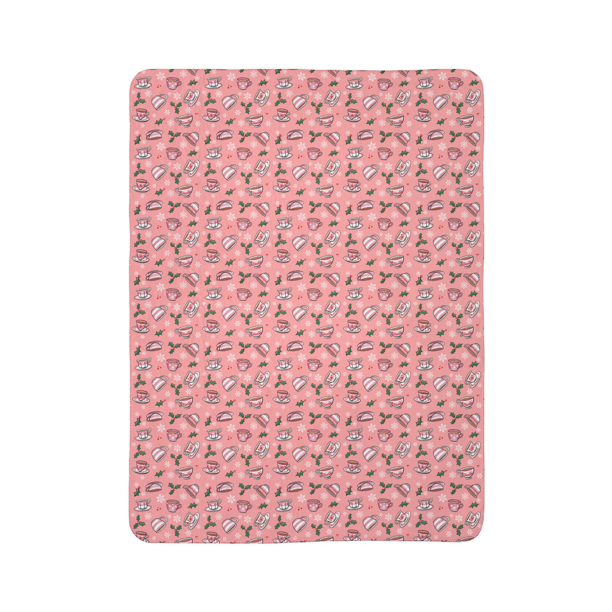 Flat view of pink fleece blanket with hand drawn teacups design with holly and snowflakes