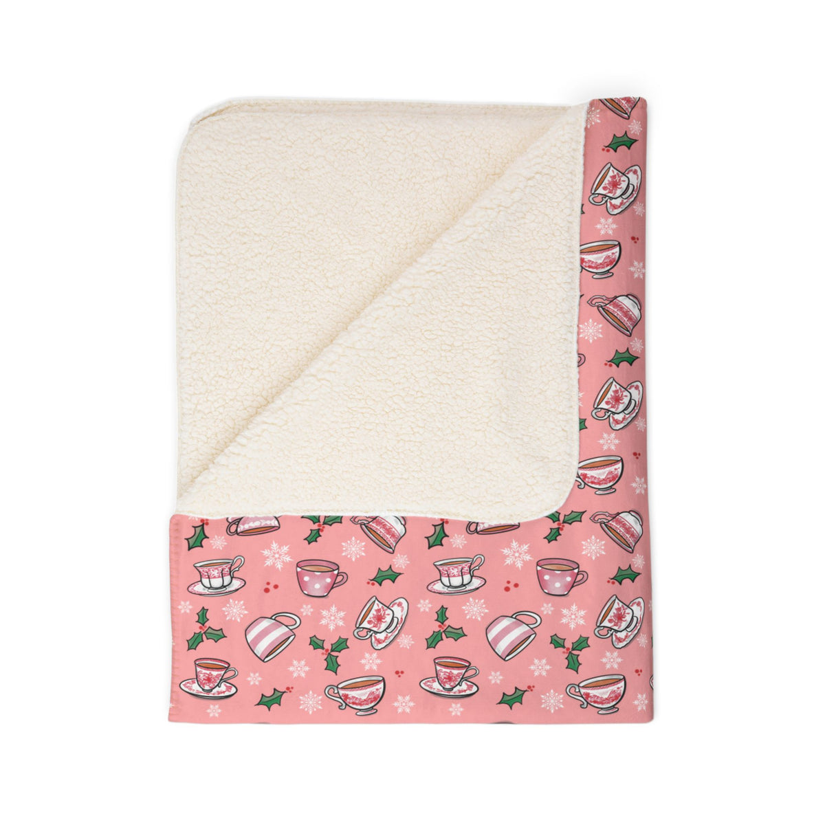 Hand drawn teacups with holly and snowflakes on a soft pink fleece blanket - Fleece texture close up